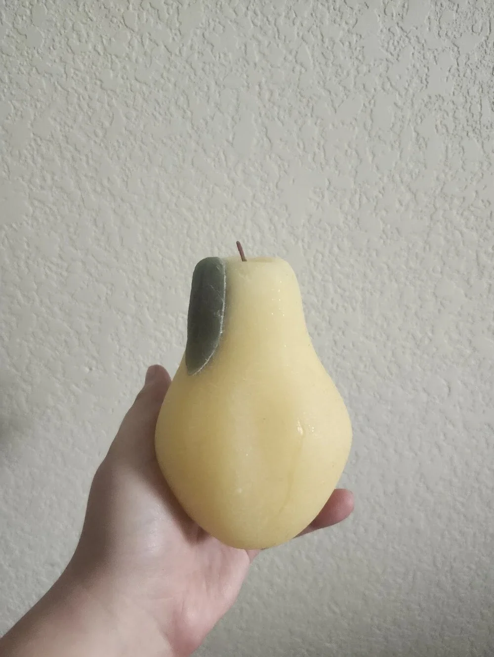 Target Yellow Pear-Shaped Decorative Candle with Green Leaf Accent
